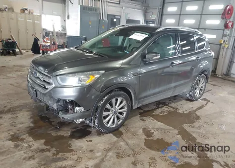 2017 Ford Escape Titanium z USA, uszkodzony, nr VIN 1FMCU9J91HUB07285